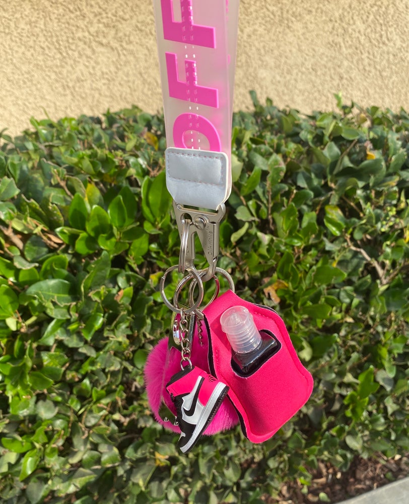 Off W x mini shoe keychains with hand sanitizer/lotion holder