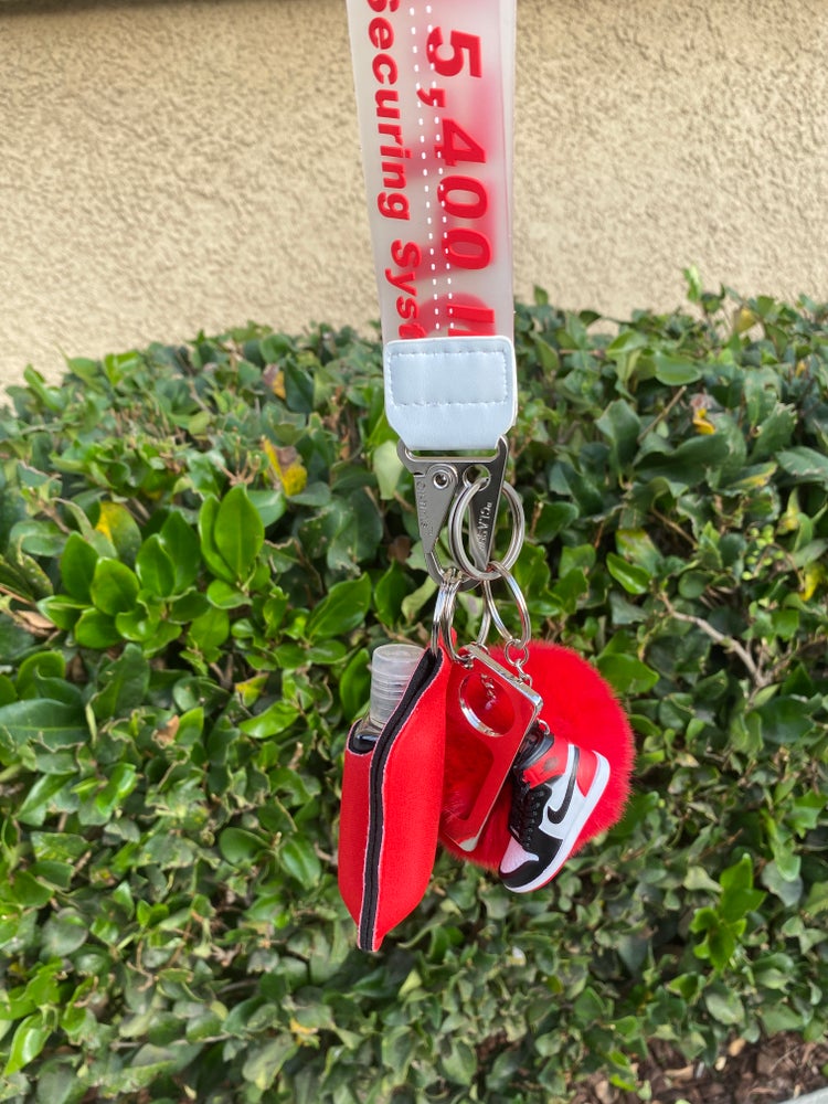 Off W x mini shoe keychains with hand sanitizer/lotion holder