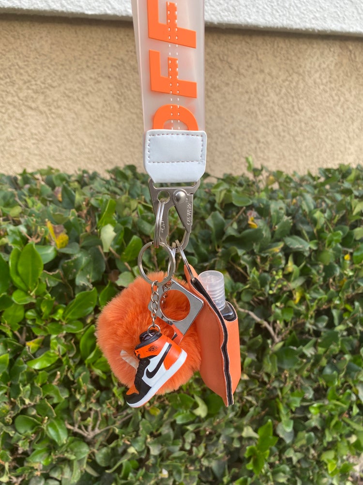 Off W x mini shoe keychains with hand sanitizer/lotion holder